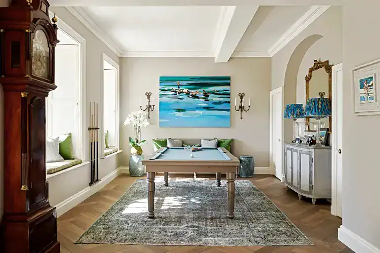 Bright and spacious living room with coastal decor and large windows near Ripon.