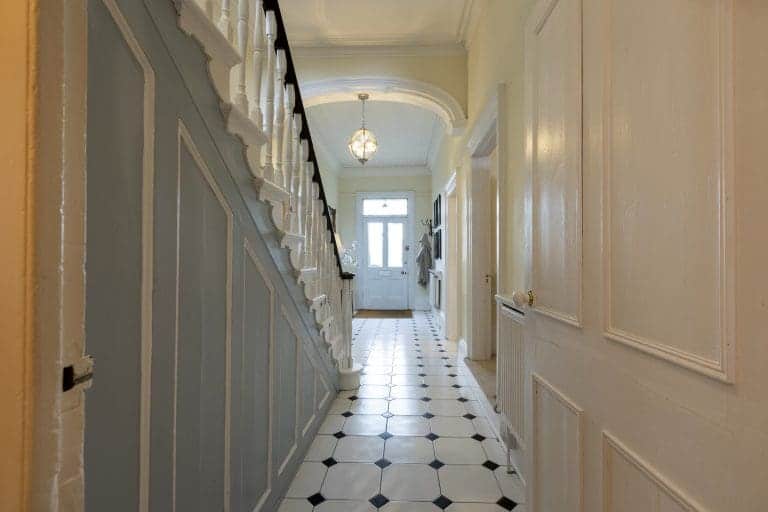 Elegant hallway in Granby House, Harrogate with classic decor and tiled floor.