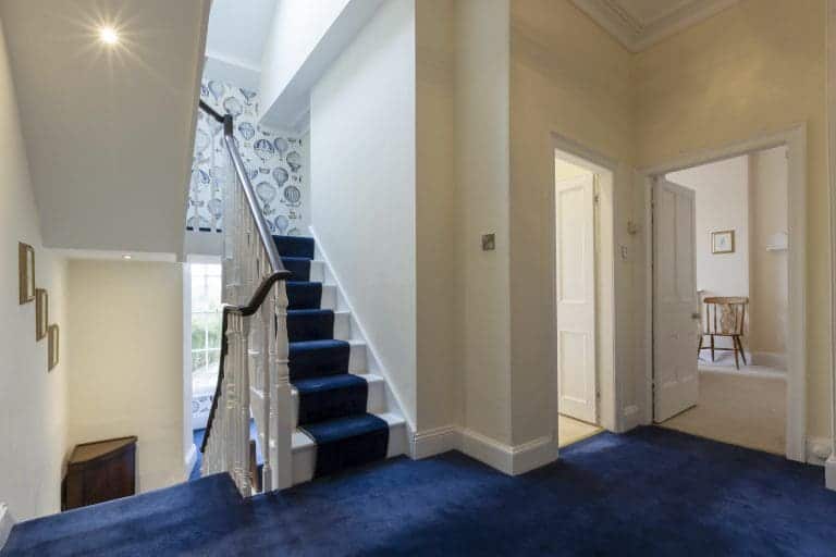 Interior view of a staircase and hallway at Granby House, Harrogate.