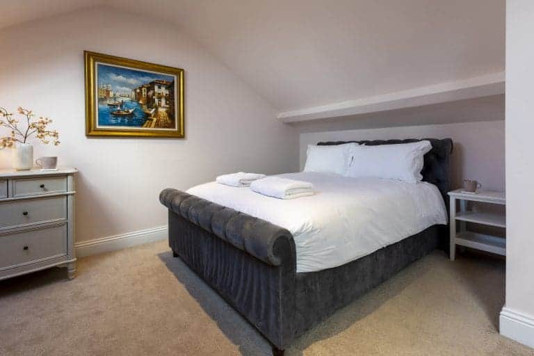 Comfortable double bed in a modern bedroom at Granby House, Harrogate.