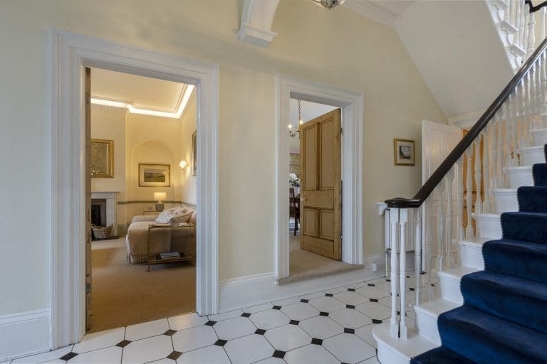 Elegant hallway with staircase and rooms at Granby House, Harrogate.