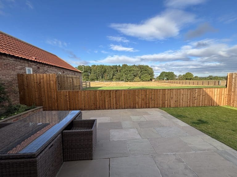 Scenic view from Catterton Barn with garden and countryside.