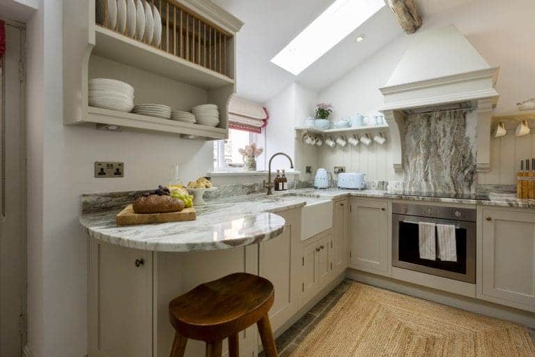 Bright, modern kitchen with skylight and neutral decor in Yorkshire Escapes property.