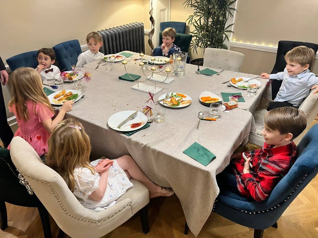 Kids celebrating a birthday at a decorated table in Pateley Bridge.